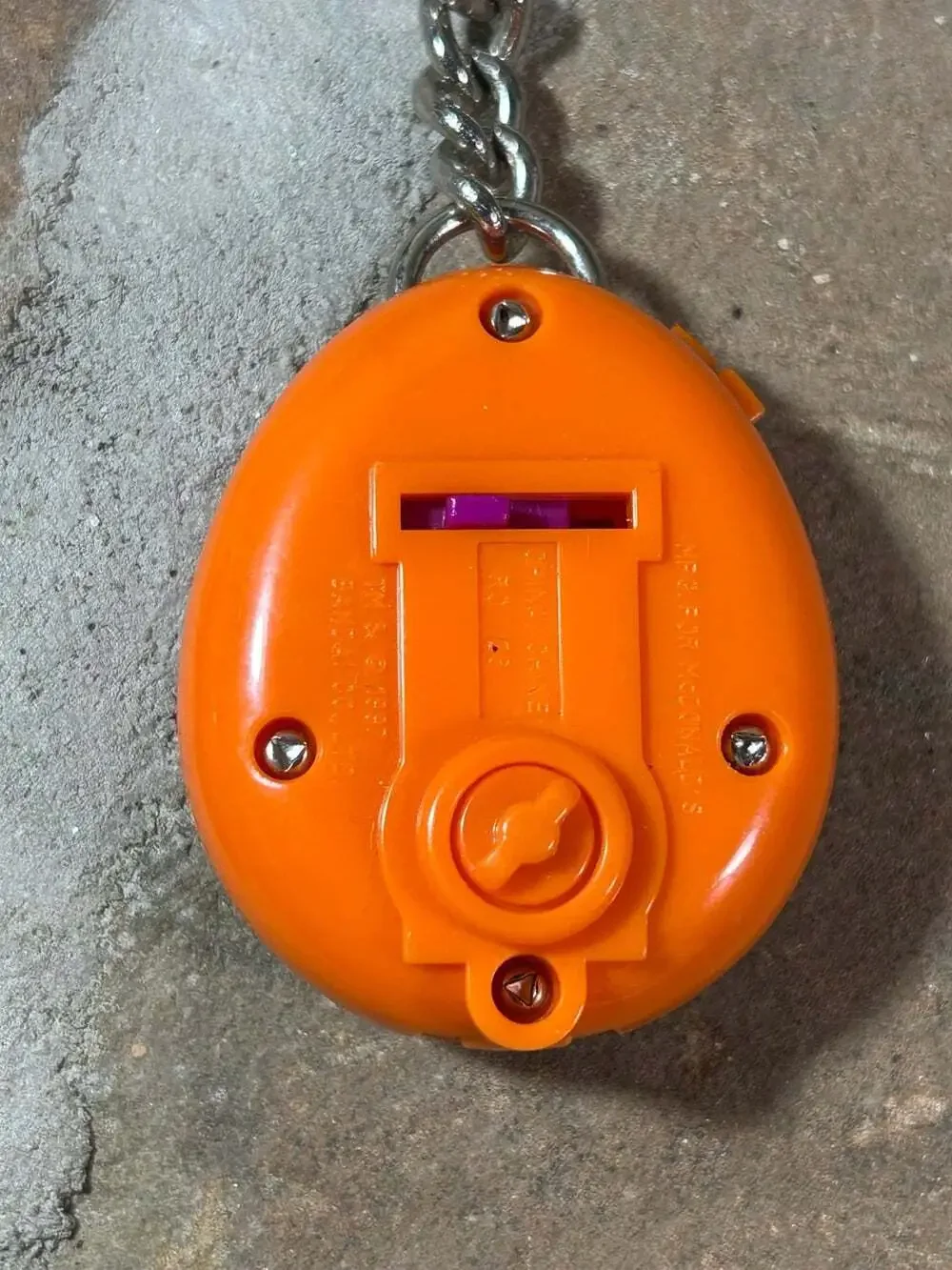 McDonalds Tamagotchi Keychains Orange and Yellow